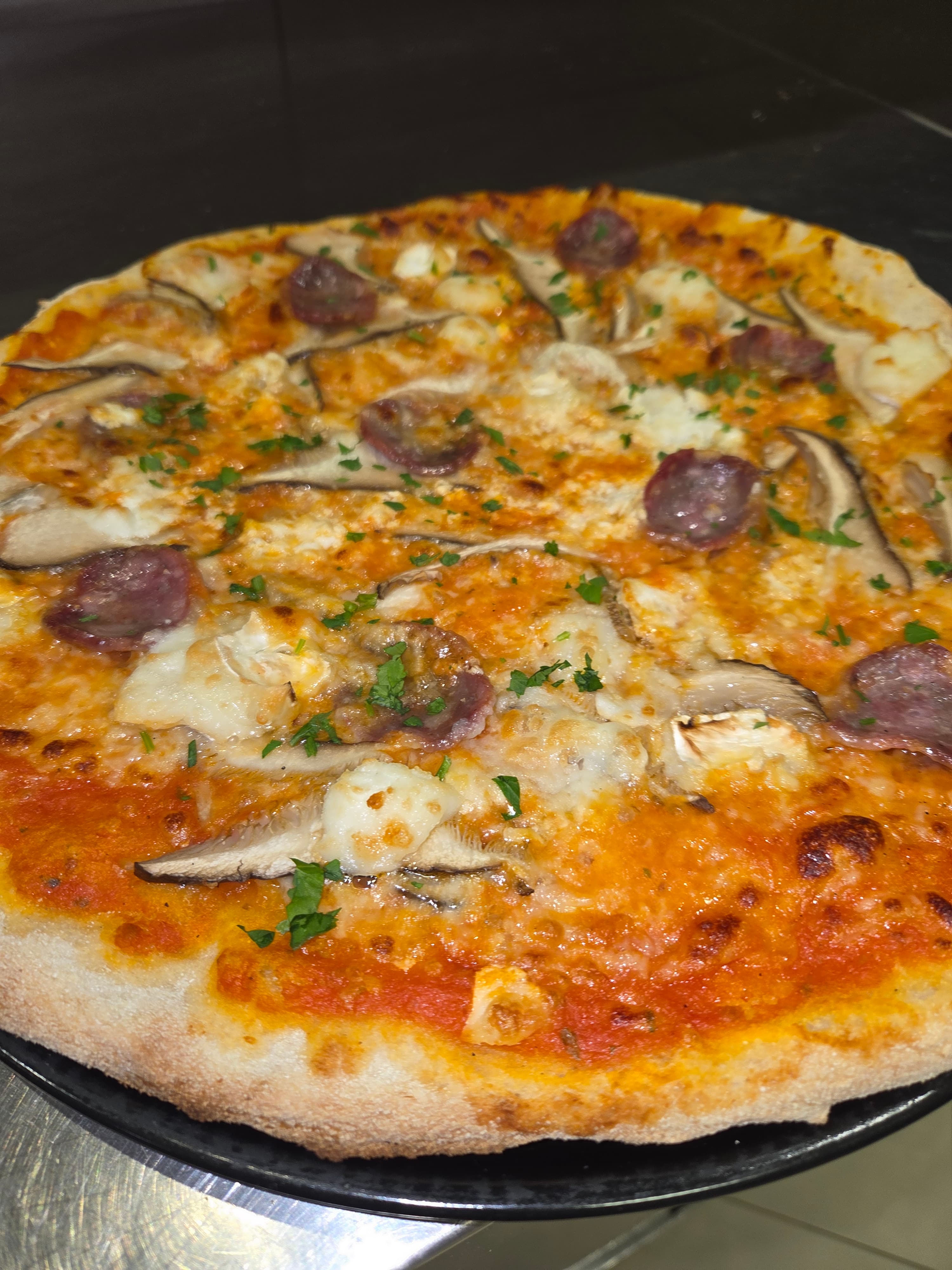 Dolce sardo,cardoncello,salsiccia affumicata ,aglio e prezzemolo 